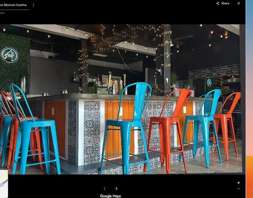 Turquoise and orange stools at the bar